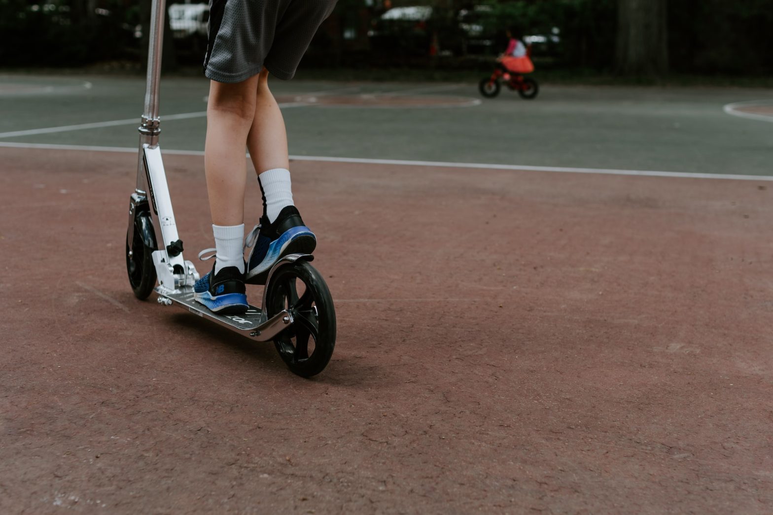 person riding scooter