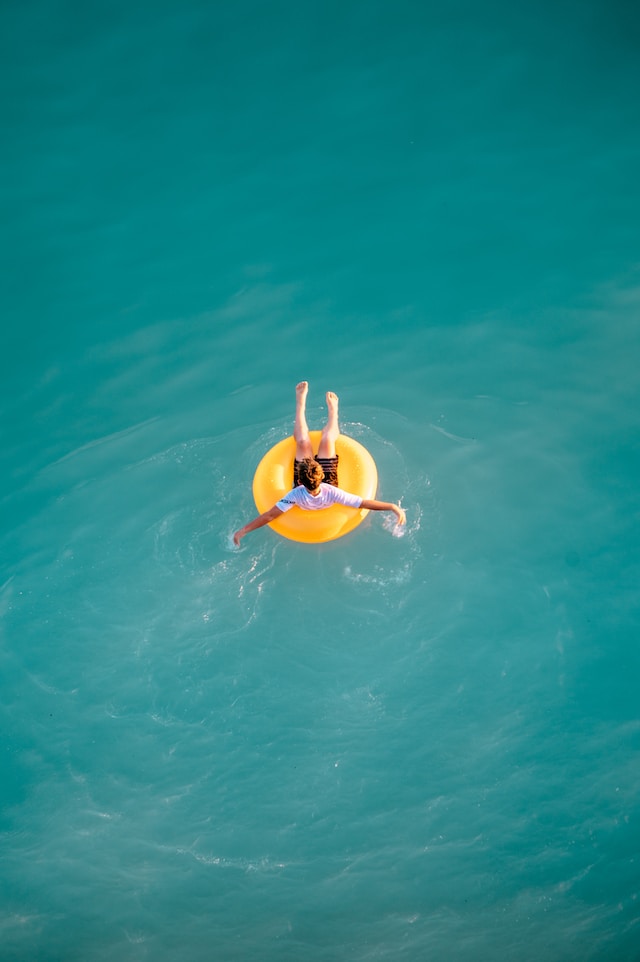 child swimming in the sea